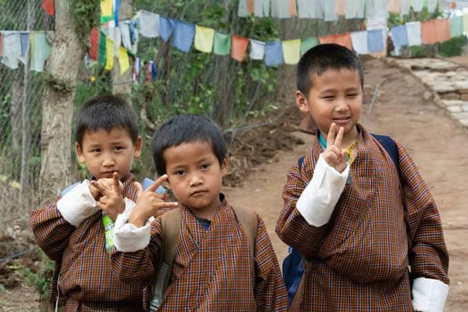 Children in Bhutan, on the way between valleys