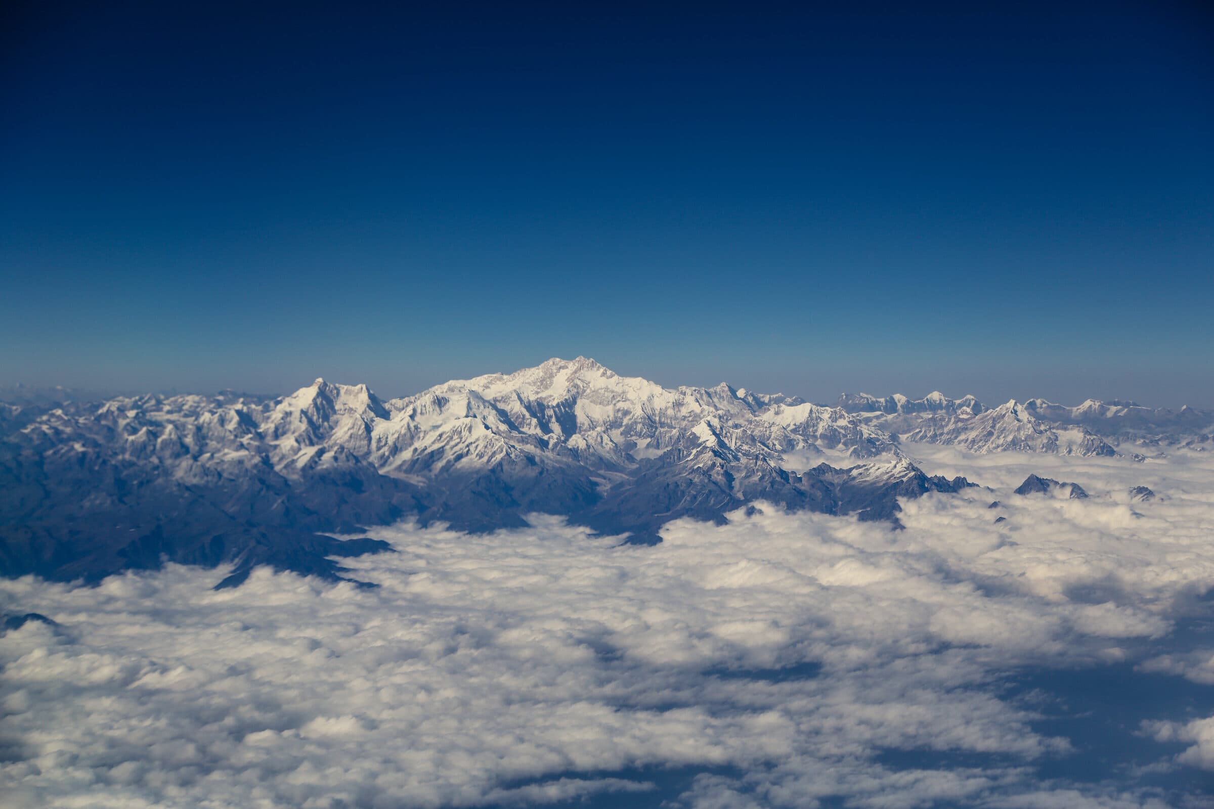 Chomolhari (7,326 m) from the Jangothang base camp at dawn, with trekkers' tents in the foreground