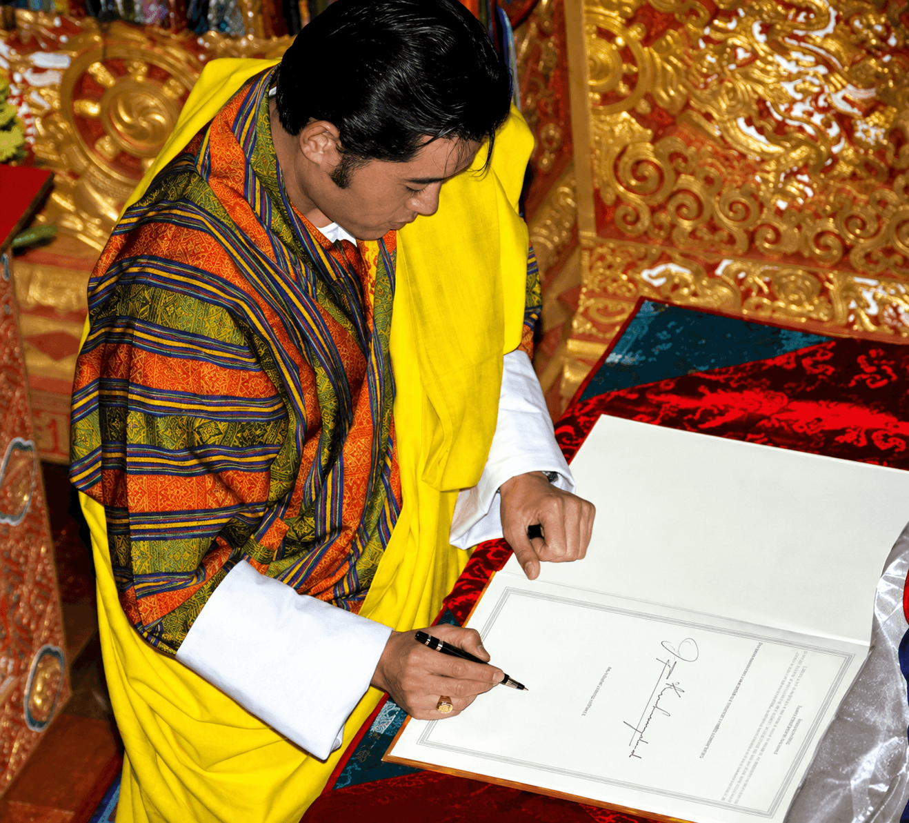 The signing of the Constitution of Bhutan at Tashichho Dzong, 18 July 2008